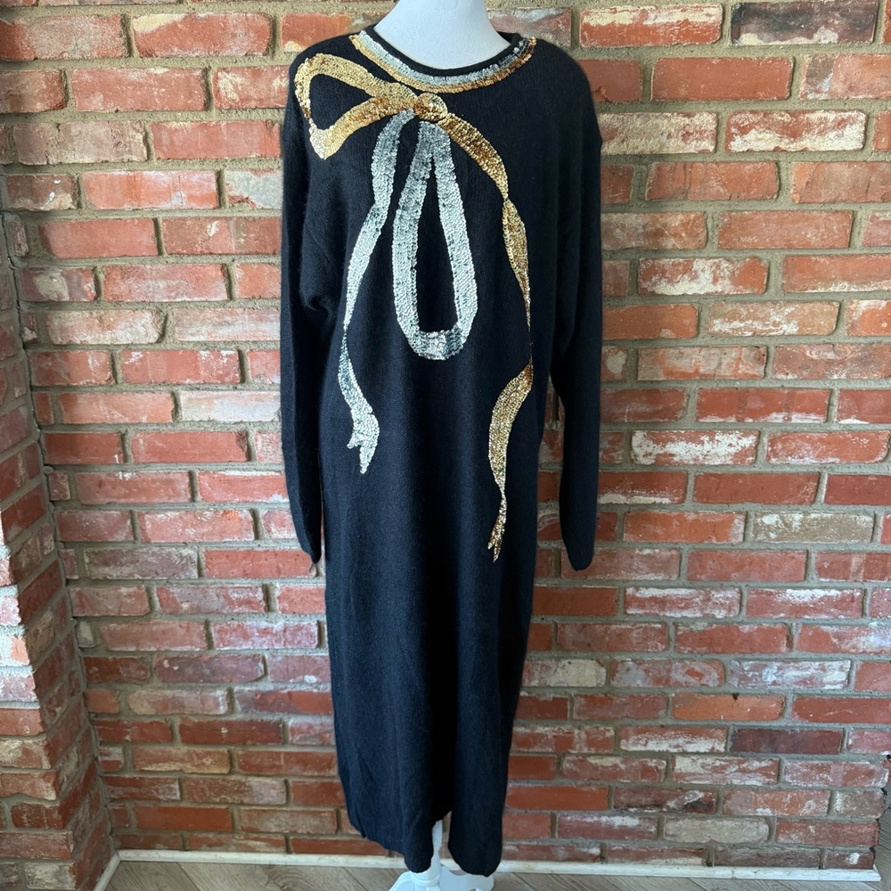 Elegant Black Dress with Gold and Silver Bow
